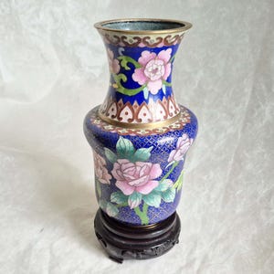 Vintage Oriental Cloisonné butterfly and floral patterned vase with wooden stand enamelled in blue, pink and green and gold-18.7cm tall