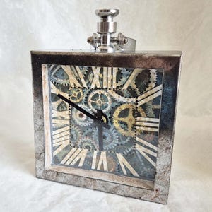 Square pocket watch style Steampunk wall clock hand decorated with faux cogs with aged silver surround-height 20cm tall