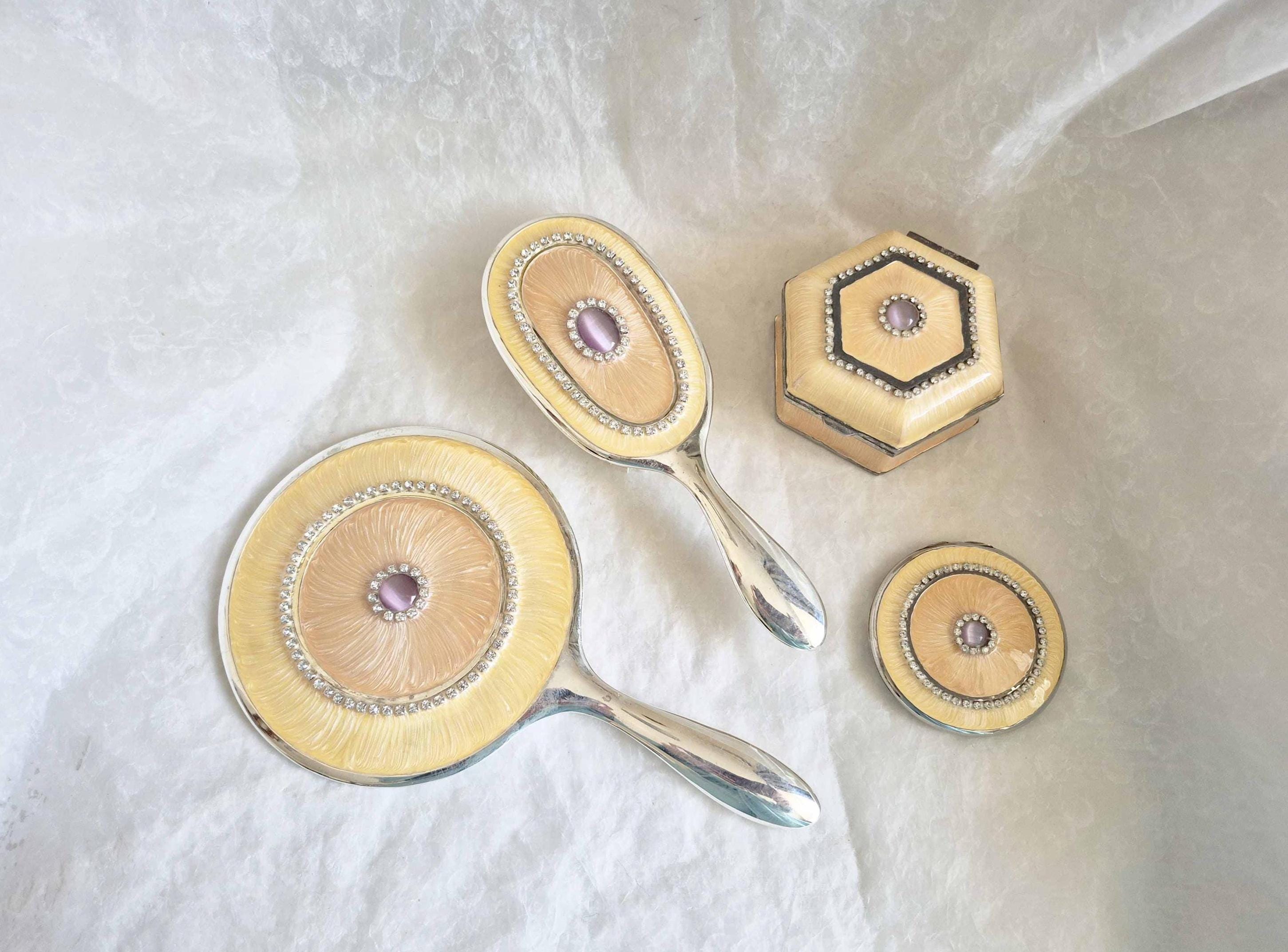 Vintage 4 piece silver, peach and yellow enamel vanity set, embellished with diamanté stones, mirror, brush, compact and trinket pot