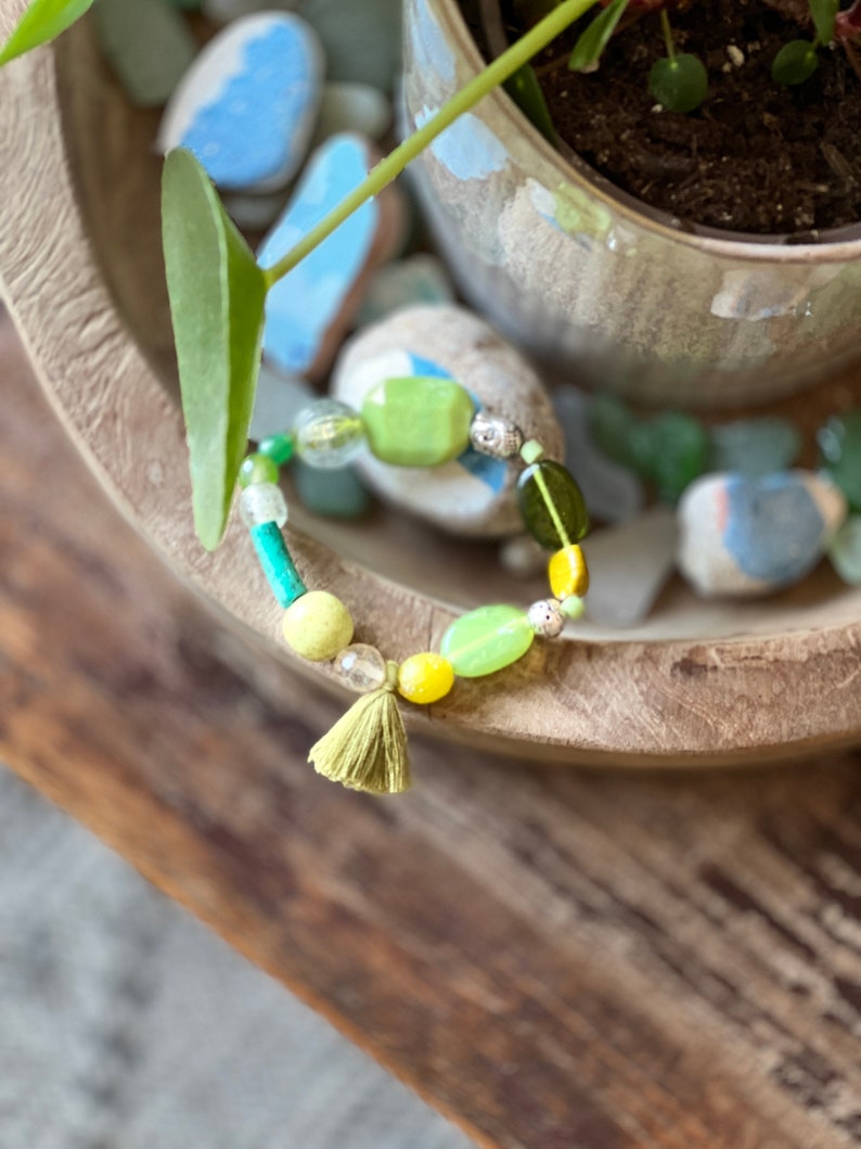 Bracelet in multi-colored African glass beads, agate, gorgon, Tibetan silver bead and green pompom. image 3