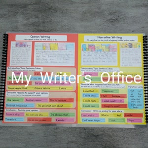 May include: A colorful educational workbook with a spiral binding. The left page is titled "Opinion Writing" and the right page is titled "Narrative Writing". Both pages have colorful sentence starters and writing prompts.