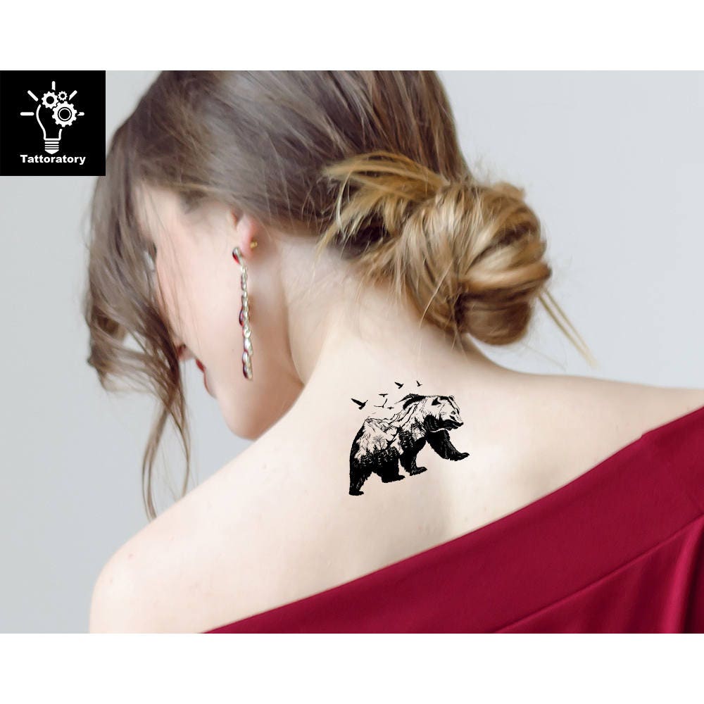 Bear in a forest sunset behind the mountains tattoo idea  TattoosAI