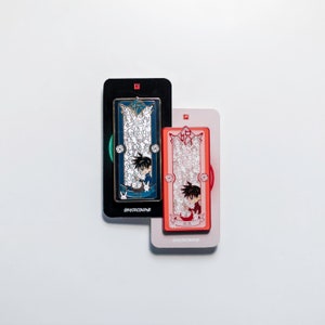 May include: A set of three ceramic mugs with a speckled, matte finish. The mugs are in shades of cream, light gray, and dark gray. Each mug has a simple, modern design and a rounded handle. Perfect for coffee or tea.