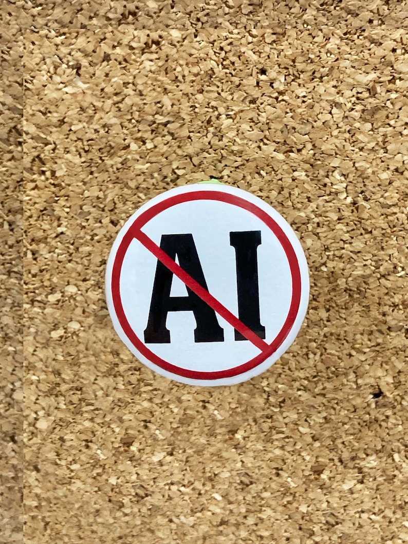 Puede incluir: Un c&iacute;rculo blanco con un borde rojo y una l&iacute;nea roja diagonal que lo atraviesa. Las letras "AI" est&aacute;n en negro dentro del c&iacute;rculo.