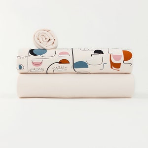 See You at Six Fabric/French Terry - Slightly Beige - R/4 way stretch/sold by the 1/2 yard.