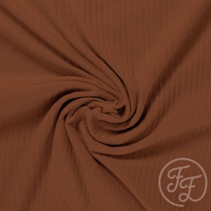Family Fabrics/Caramel Cafe Uni/rib knit Jersey/4 way stretch/RIBBED 8x4/sold by the 1/2 yard.