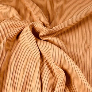 Family Fabrics/sandstorm/Jersey knit RIBBED/4 way stretch/8x4 rib/sold by the 1/2 yard.