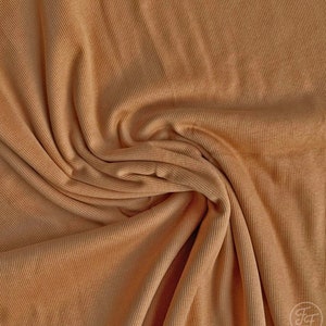 Family Fabrics/sandstorm/Jersey knit/4 way stretch/RIBBED 1 mm rib/sold by the 1/2 yard.