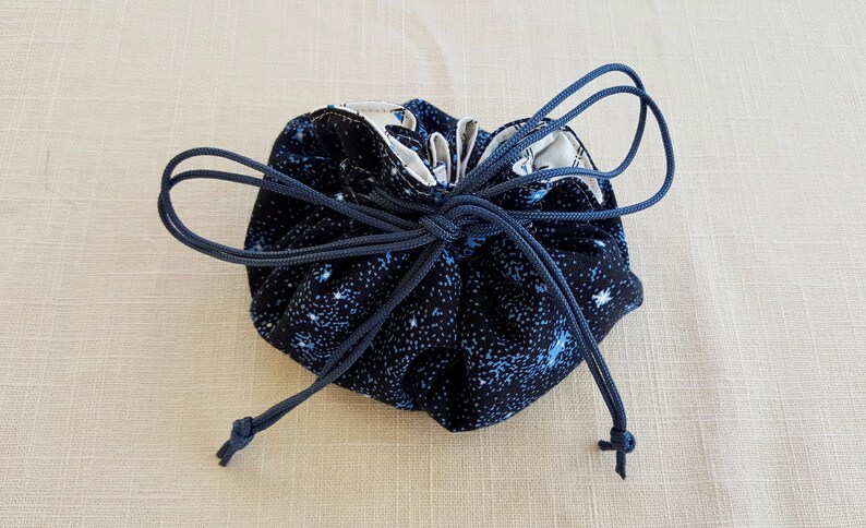 Tan Thread Cosmic Circular Cinch Bag