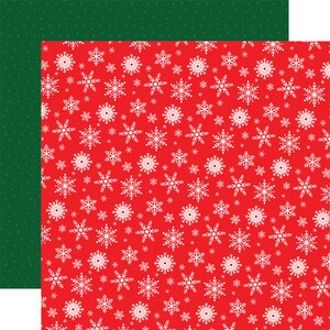 May include: A red background with a repeating pattern of white snowflakes of various sizes.