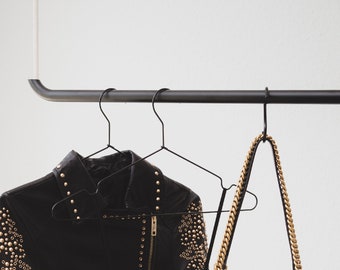 Ceiling mounted clothes rail