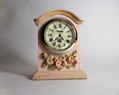 A fully working quartz miniature vintage clock antique styled mantle clock