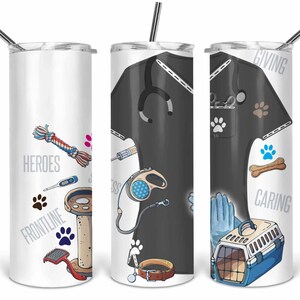 May include: Three stainless steel tumblers with a white background and a design featuring a cartoon vet in a black scrub top with various veterinary tools and the words "Giving", "Caring", "Heroes", and "Frontline".