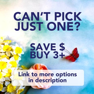 May include: A blue and white text graphic on a light blue background with a bouquet of white and yellow daffodils and a red butterfly. The text reads "Can't pick just one? Save $ Buy 3+" and "Link to more options in description."