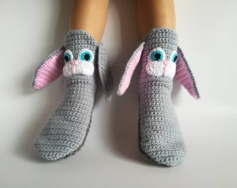 Bunny animal home slippers as fun kids gifts, Rabbit socks eating your feet as unusual Christmas gift