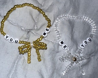Juego de 2 pulseras inspiradas en la “cuerda invisible”