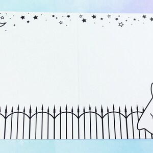 The card lying open and flat