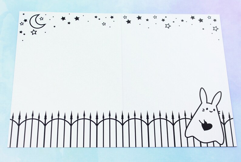 The card lying open and flat