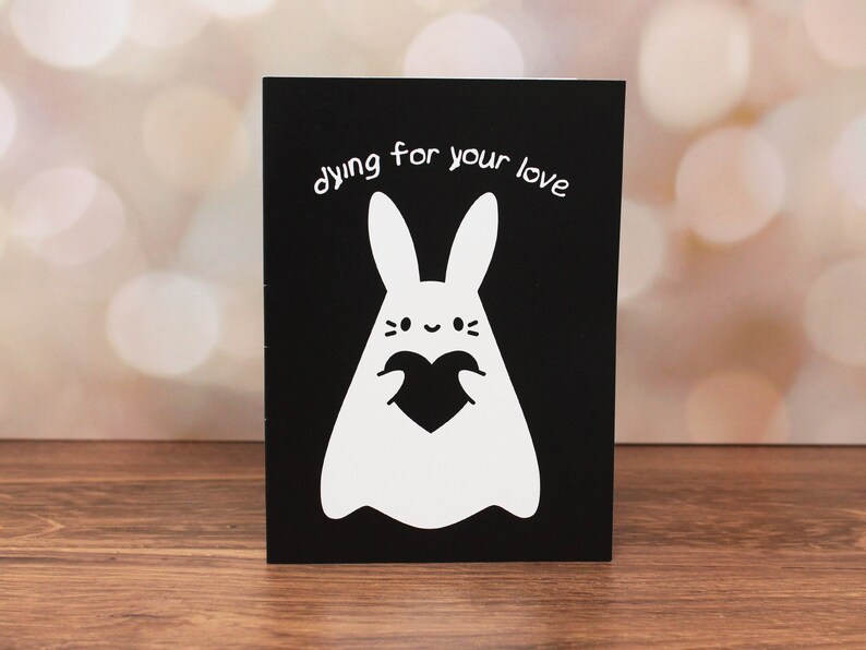 Dying for your love black greeting card is photographed