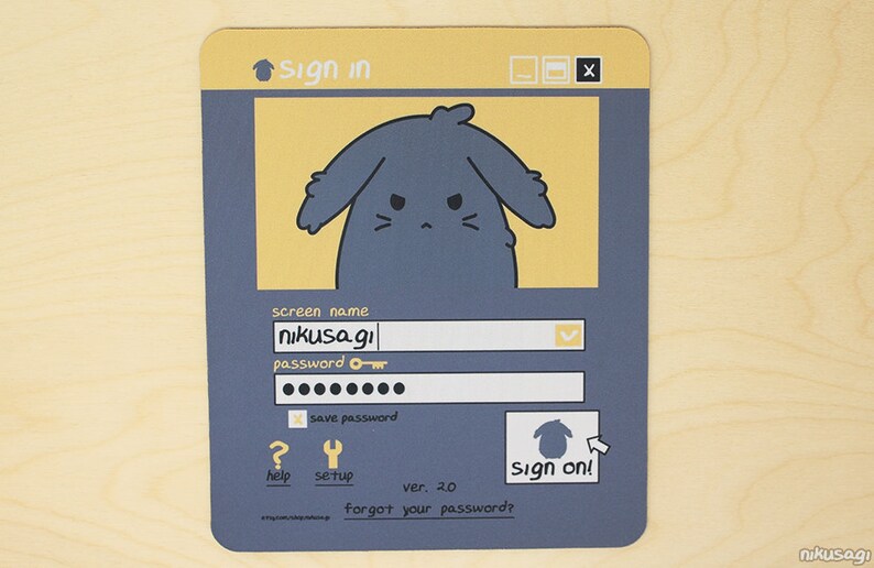 May include: A rectangular mousepad with a cartoon bunny design in a computer interface style. The design includes a login screen with fields for screen name and password, and the text "Sign in" and "Sign on!". The mousepad is mainly blue and yellow.