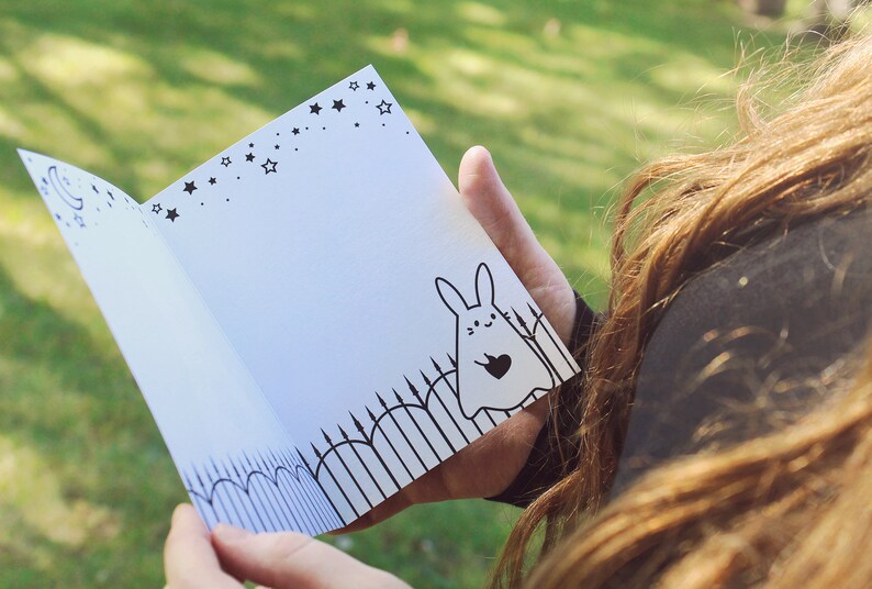 A peek at the card's drawn interior. It's blank and without text.