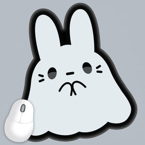 May include: A white ghost-shaped mousepad with black outlines and a cute cartoon bunny face. The bunny has black eyes, a small black nose, and a black mouth.