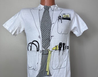 Vintage 1970s Leslie Arwin T-Shirt, Doctor Lab Coat Kefzol, Hanes Beefy-T Size Small, Trompe L'oeil