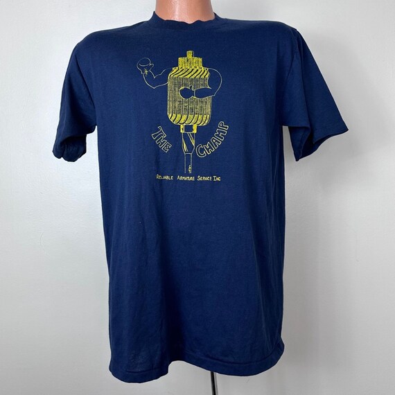 Vintage 1980s Reliable Armature Service Inc The Champ T-Shirt, Sportswear Size M/L