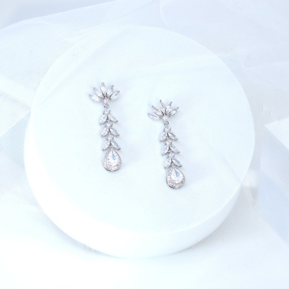 Swarovski millennium shop cross earrings