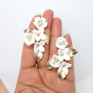 Clip on Ceramic White Flower Crystal And Gold Leaves Earrings, Long Bridal Jewelry, Flower Bridal Earrings, Statement Earrings