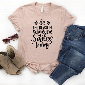 Be The Reason Someone Smiles Today Womens T-Shirt | Womans Inspirational T-Shirt  | Unisex Misses and Plus Size Assorted Colors Available