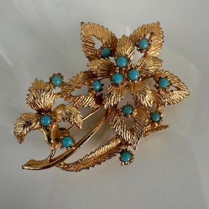 Vintage gold tone turquoise brooch
