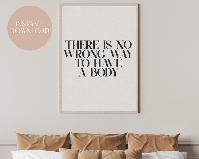 Puede incluir: Una impresi&oacute;n enmarcada con el texto "No hay una forma incorrecta de tener un cuerpo" en texto negro sobre fondo blanco.