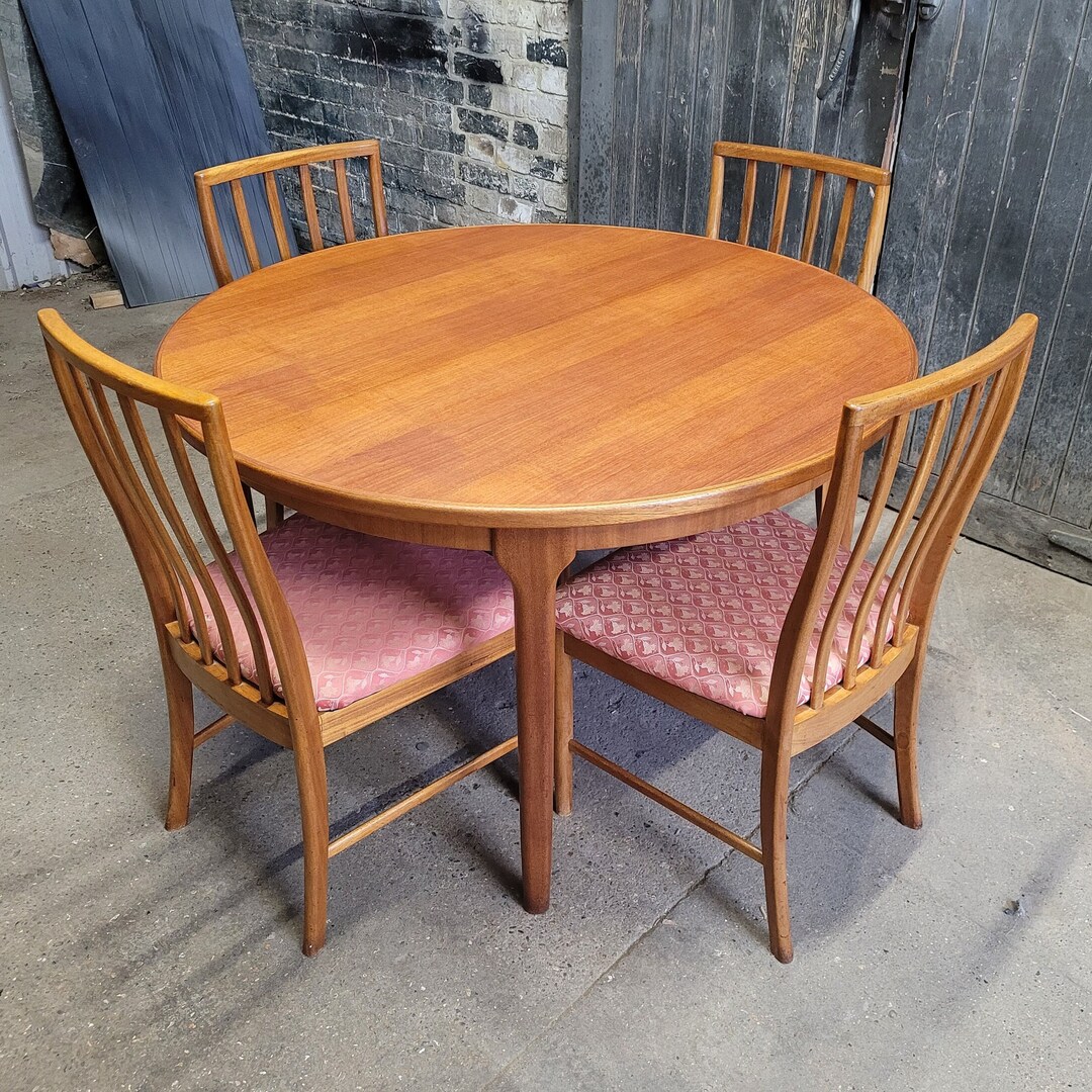 Mid Century Mcintosh Circular Extending Dining Table and Four Dining ...