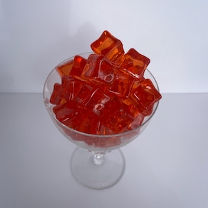 Jello cubes in glass cup