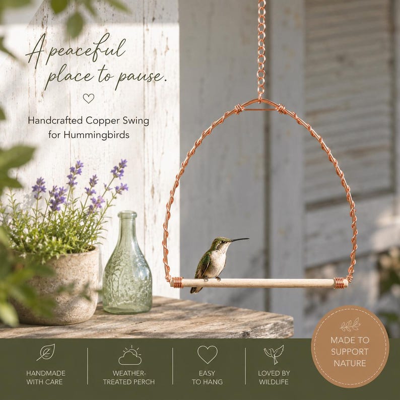 May include: A copper wire swing for hummingbirds featuring a horizontal wooden perch suspended by a metal chain. The text reads: A peaceful place to pause. Handcrafted Copper Swing for Hummingbirds. Made to support nature. Handmade with care.