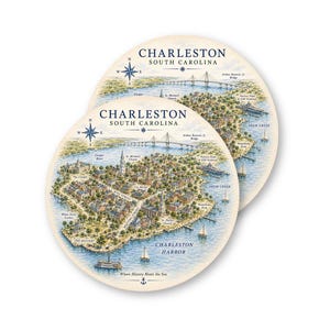 May include: Two round coasters featuring a detailed map of Charleston, South Carolina. The coasters display the city's harbor, bridges, and landmarks, with the text "Charleston South Carolina" and a compass rose. The phrase "Where History Meets the Sea" is also included.