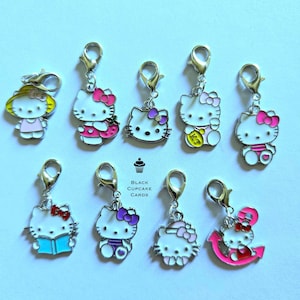 Hello Kitty Clip-on-berlocker: Kalender, Armband, Dragkedja