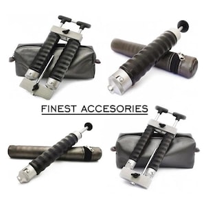 Könnte beinhalten: Vier verschiedene Arten von Werkzeugen zum Abfüllen und Versiegeln von Flaschen. Die Werkzeuge sind silber und schwarz und werden mit einem Etui geliefert. Die Werkzeuge sind mit "FINEST ACCESSORIES" beschriftet.