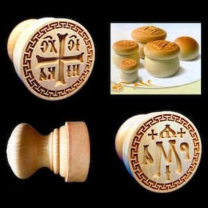 May include: A selection of wooden stamps featuring religious symbols. The stamps are light brown and intricately carved with crosses and other religious iconography. The image also shows several small, round baked goods with stamped designs.