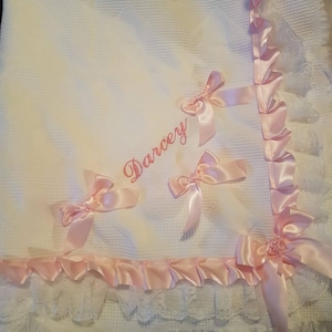 Chal de bebé personalizado con lazos