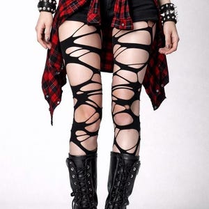 Pantyhose with a distressed cut-out design,punk,goth,postapocalyptic,burner