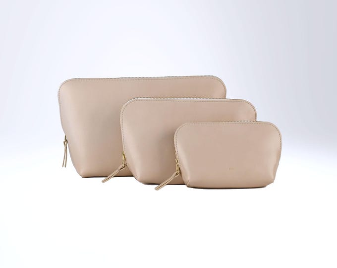 Cosmetic Bags, three sizes with zipper, genuine leather, color ivory