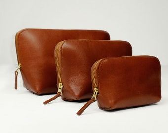 Cosmetic Bags, three sizes with zipper, genuine leather, color chestnut