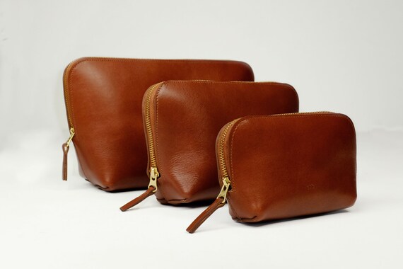 Cosmetic Bags, three sizes with zipper, genuine leather, color chestnut