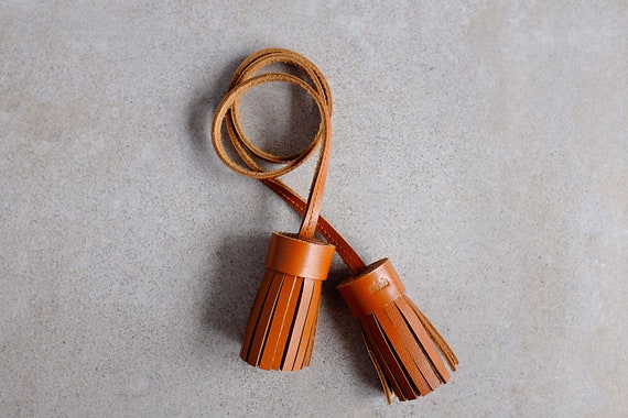 Double tassel, tassel in cognac real leather