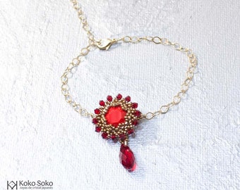 Bracelet with antique Swarovski crystal in red and gold Japanese glass beads and gold filled chain