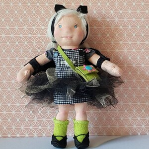Meet Lilou, waldorfinspired doll. She is a very sweet girl and  sometimes a little naughty and dressed for halloween.