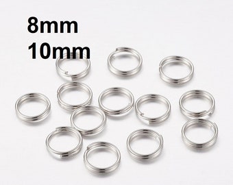 May include: A close-up of a group of silver jump rings, some are 8mm and some are 10mm in diameter.