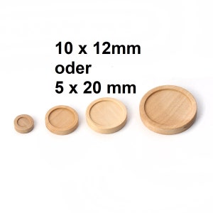 Pode incluir: Quatro bases redondas de madeira para bandejas de diferentes tamanhos. As bases medem 5 x 20 mm ou 10 x 12 mm.